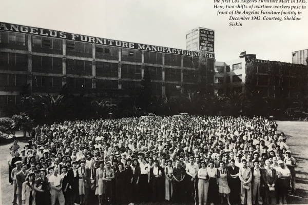 Historic photo showing Angeles furniture building with hundreds of workers posing in front of it