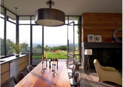 Extended Wood dining table in kitchen with expansive mountain views